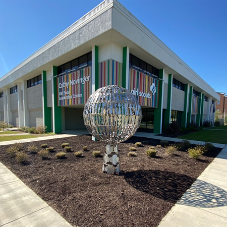 Cathy Novinger Girl Scout Leadership Center with sculputure out front